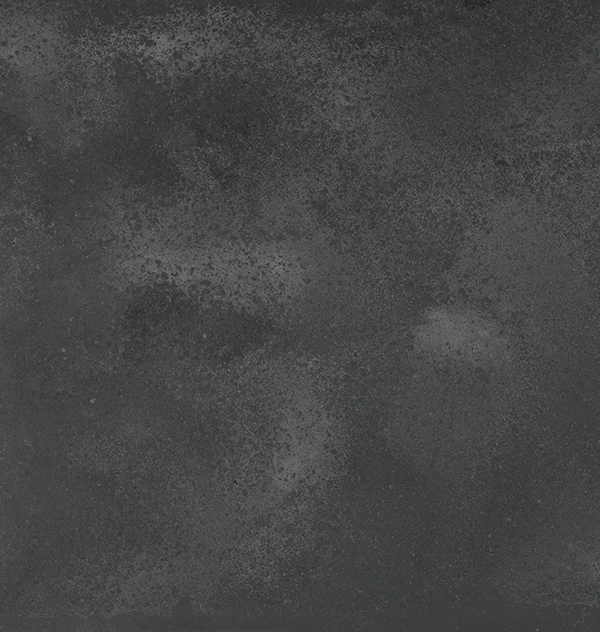 Dark, cloudy sky with subtle, scattered patches of lighter gray clouds.